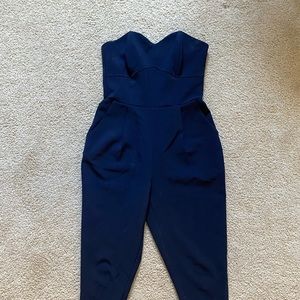 Navy strapless jump suit size small